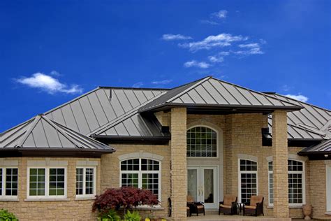 painted brick house with brown metal roof|brick exterior brown roof.